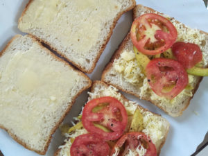 Ingredients arranged on bread