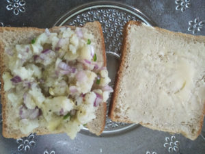 Mashed potato filling on bread