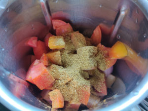 Grinding Tomato, Onion and Masala to a paste